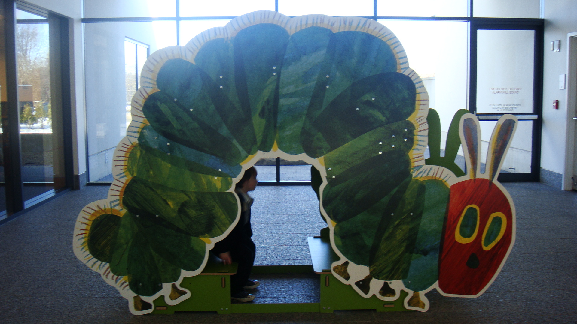 A giant cut-out of a illustration from a picture book at the main entrance of the museum. 