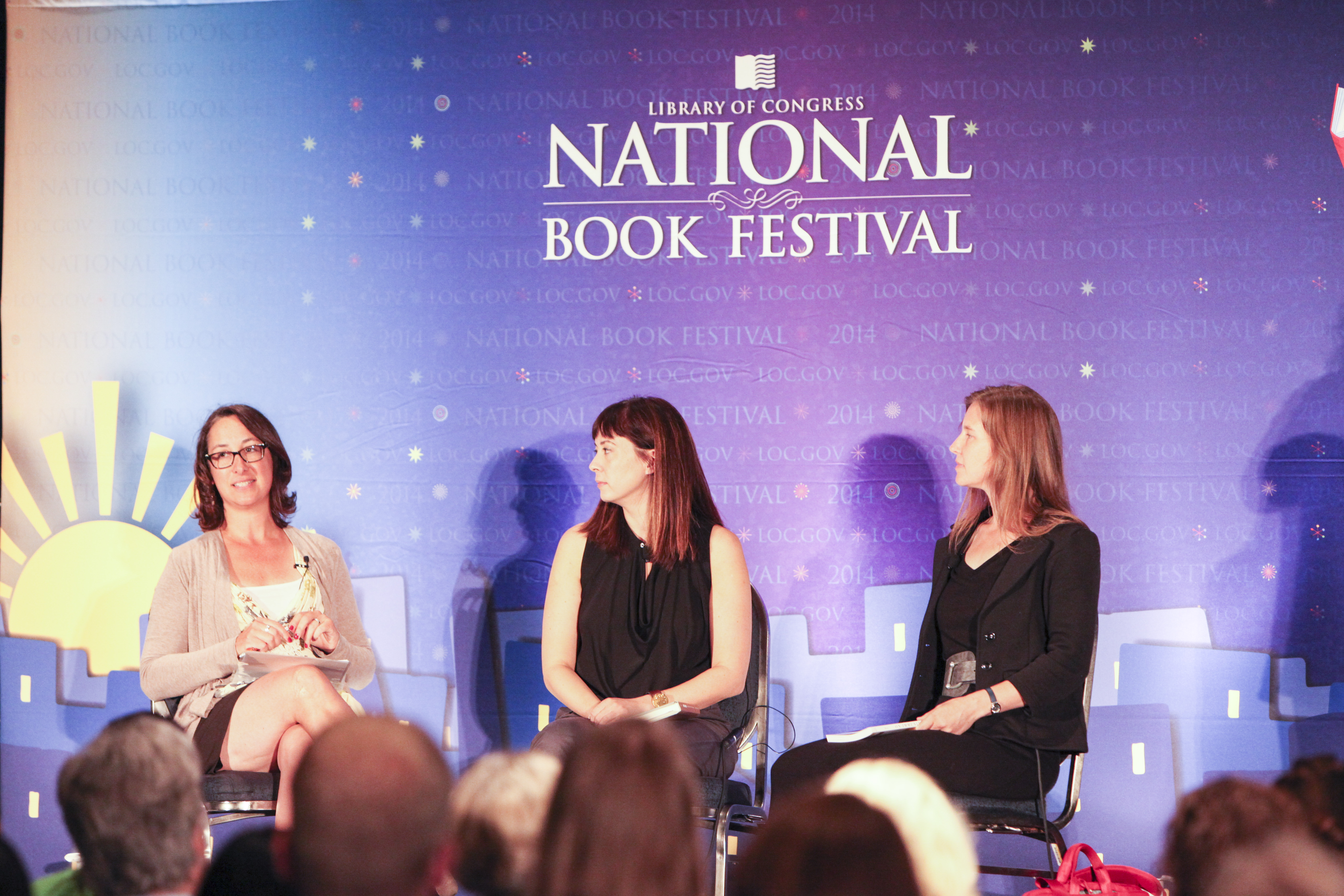 NEA Literature Director on stage with NEA Creative Writing Fellows Paisley Redkal and Eula Biss.