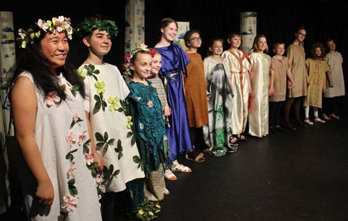 Young performers line up for standing ovation