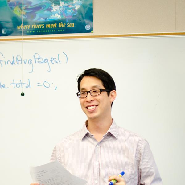 Gene Luen Yang in classroom teaching. 
