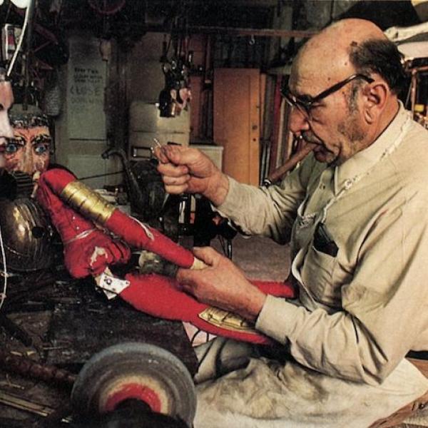 A man working on a puppet.