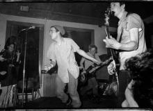 Minor Threat (with Ian MacKaye in middle in hat) performing at the former Washington, DC club dc space. Photo by Susie J. Horgan