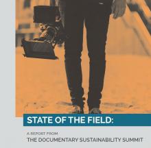 report cover with lower half of a camera man holding a camera