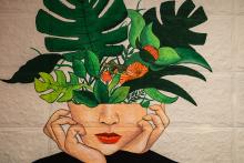 a painting of a woman in which her head is filled with leafy plants