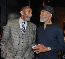 Ron Carter (left) chats with Hubert Laws at the 2011 NEA Jazz Masters luncheon in New York City in January 2011. Photo by Frank Stewart