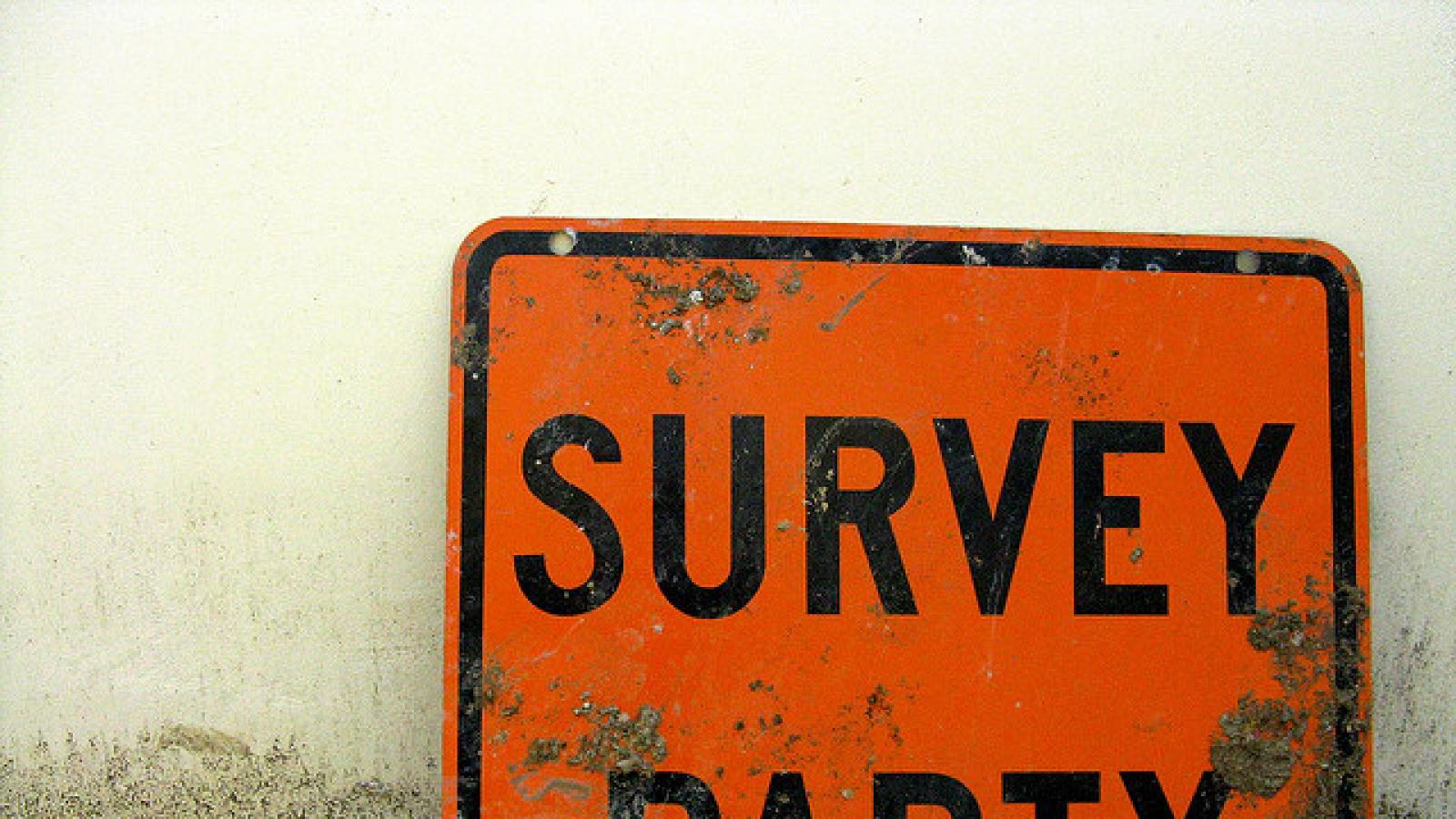 Construction sign that says "survey party"