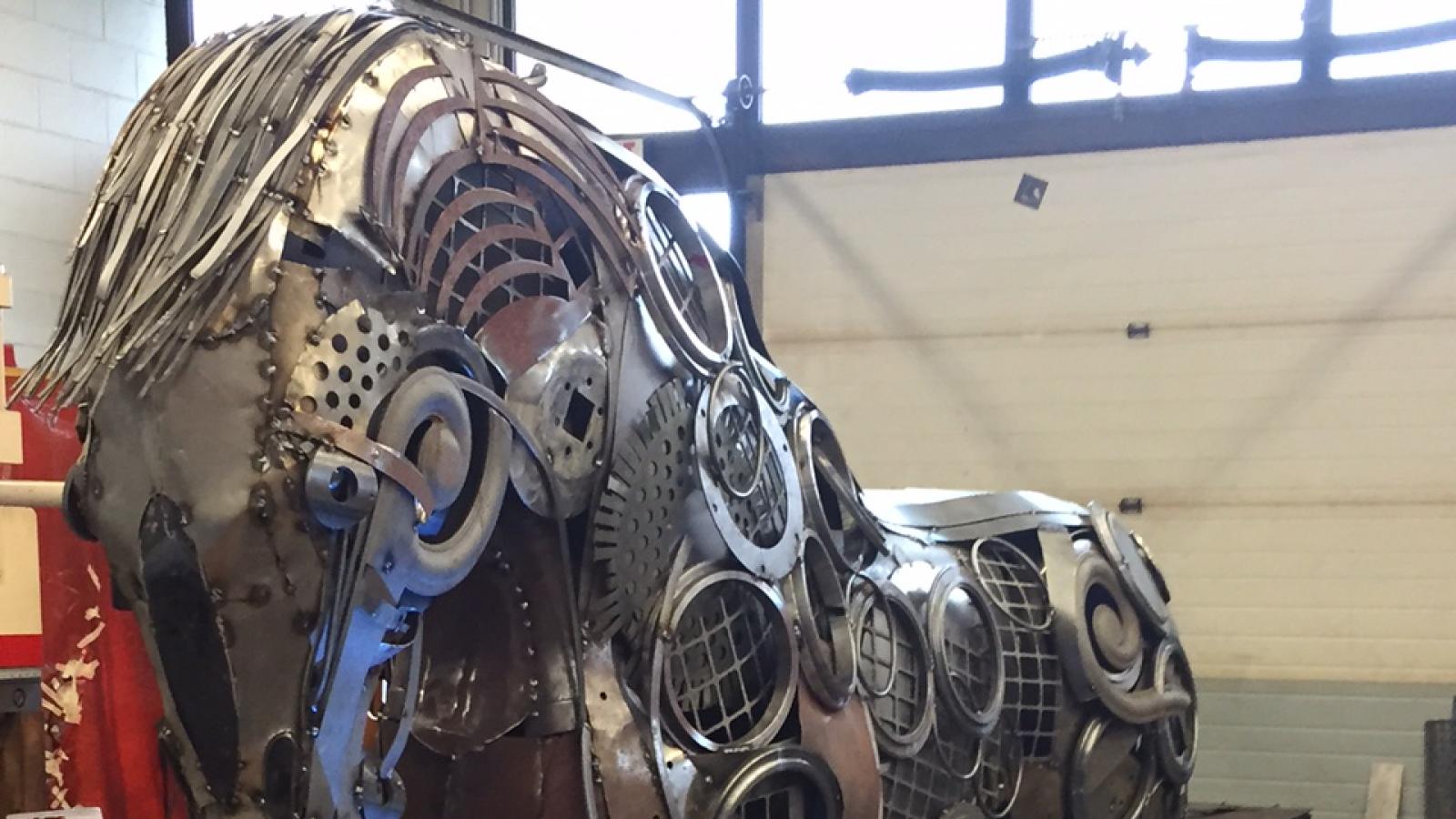 students create metal horse with blowtorches