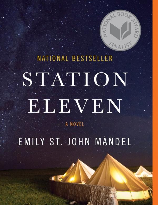 Book cover: title and author name in white over a background of large night sky and canvas tents illuminated from within behind a stone wall 