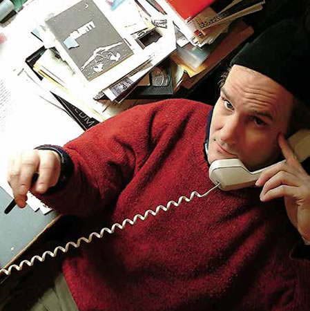 Ian MacKaye on the phone. Photo by Amy Farina