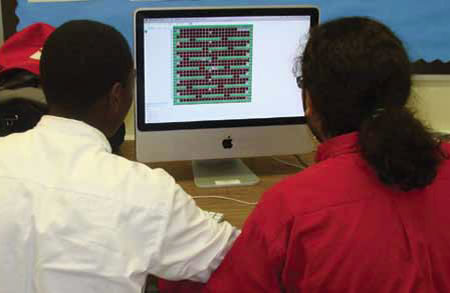 Students at Cleveland School of the Arts in Ohio working on designing video games. Photo by Joe Ionna