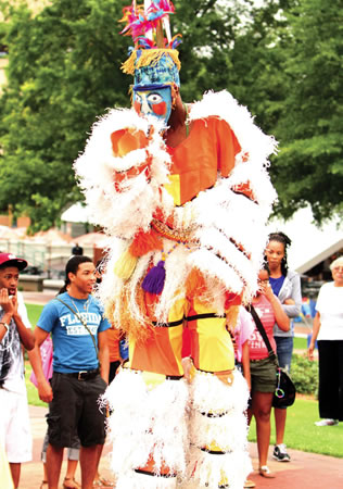 A performance at the festival&#039;s Children&#039;s Education Village at Centennial Park