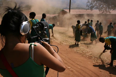Filmmaker Ya-Hsuan Huang captures Edith Kaphuka and her fellow students sweeping sweeping at recess in Ngwale Village, Malawi, as part of the Global Lives Project. Photo by Jason J. Price