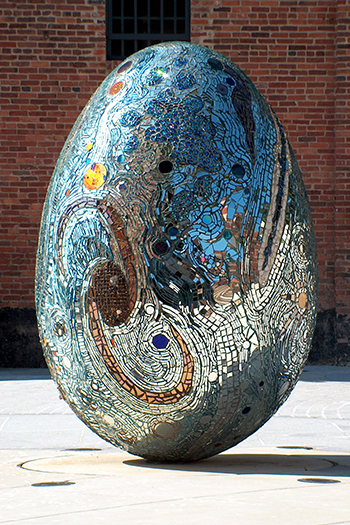Cosmic Galaxy Egg by Andrew Logan An egg shaped sculpture mosaiced with mirrored pieces
