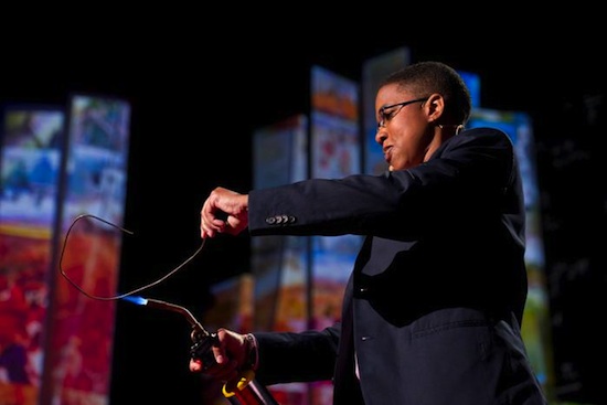 Ainissa Ramirez uses a blowtorch and some wire to demonstrate a scientific principle at a TED Talk