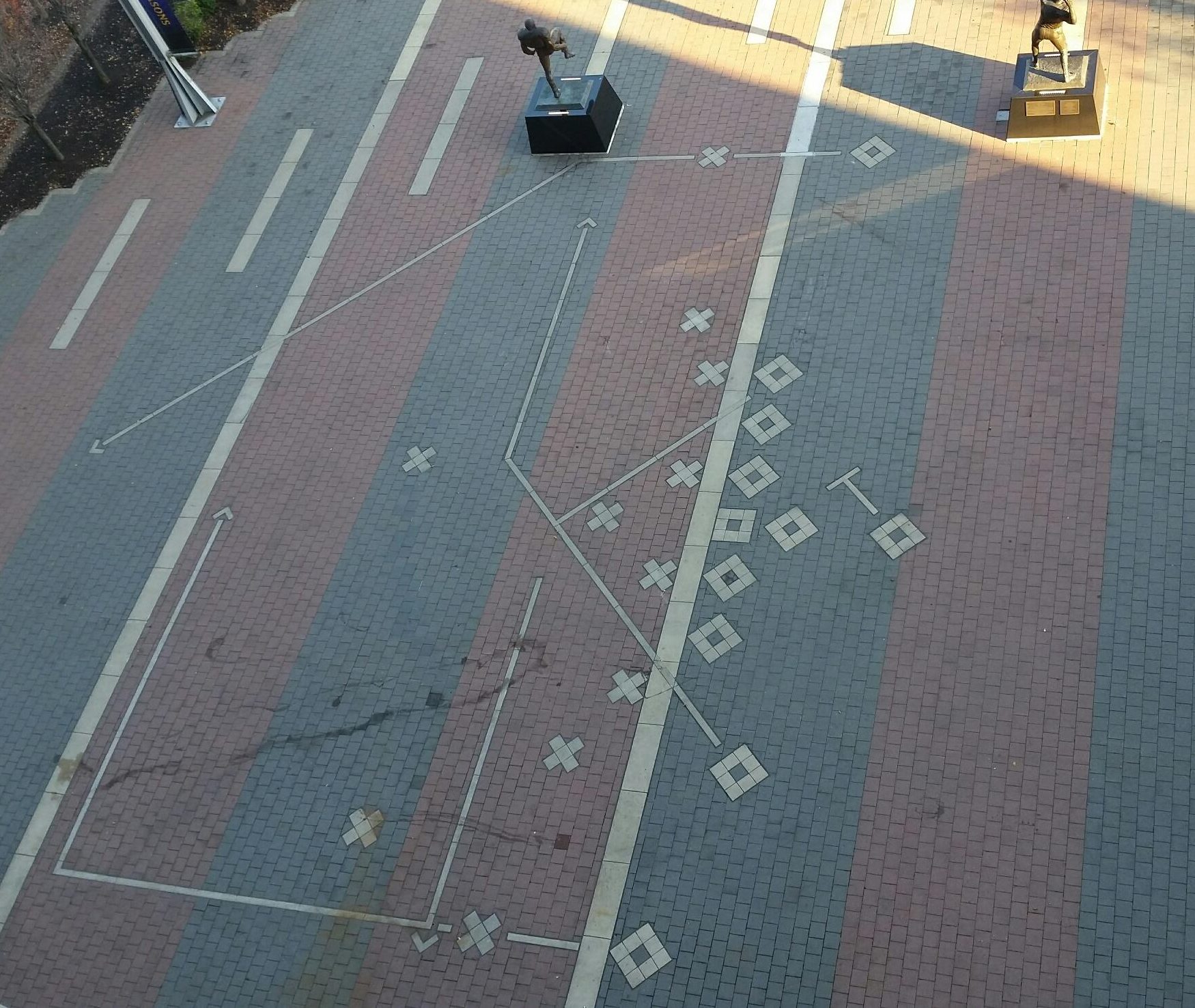 A mural of a football play. 
