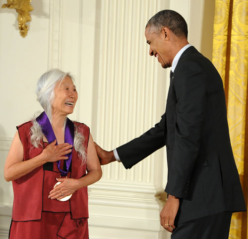 Maxine Hong Kingston receiving the National Medal of Arts from Barack Obama
