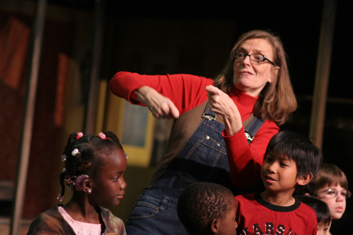 Deaf West’s Dramatic Gestures educational program A teacher sign languaging for students.
