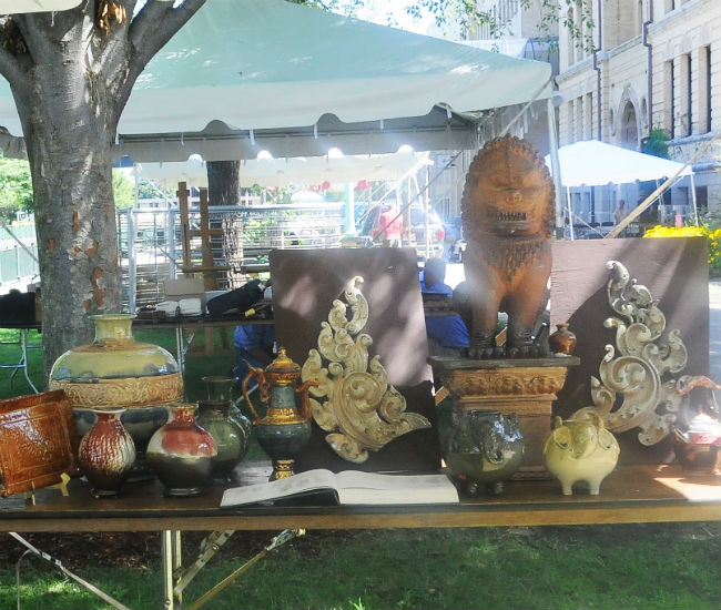 A table covered with ceramic pots