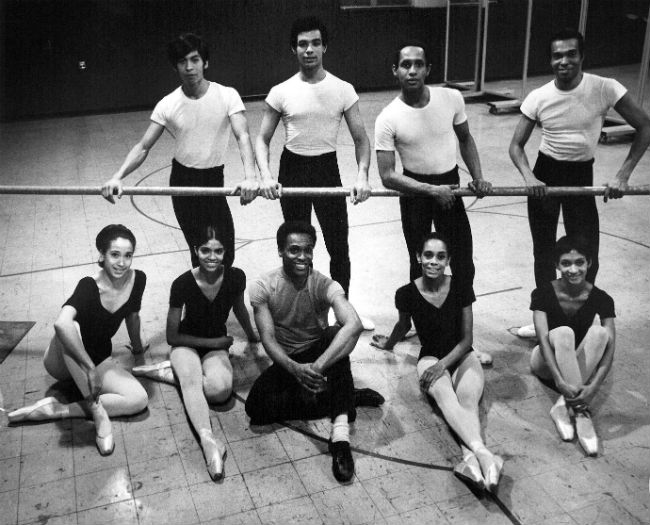 Group of ballet dancers smiling for camera