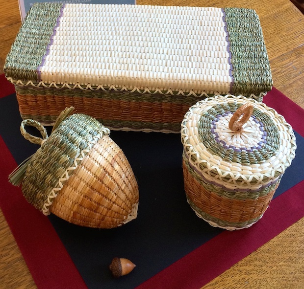 Several colorfull wicker baskets.