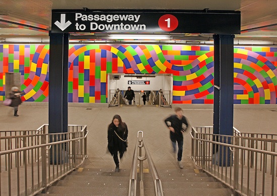 a multicolored-colored mosaic by Sol LeWitt of undulating lines above stacked lines