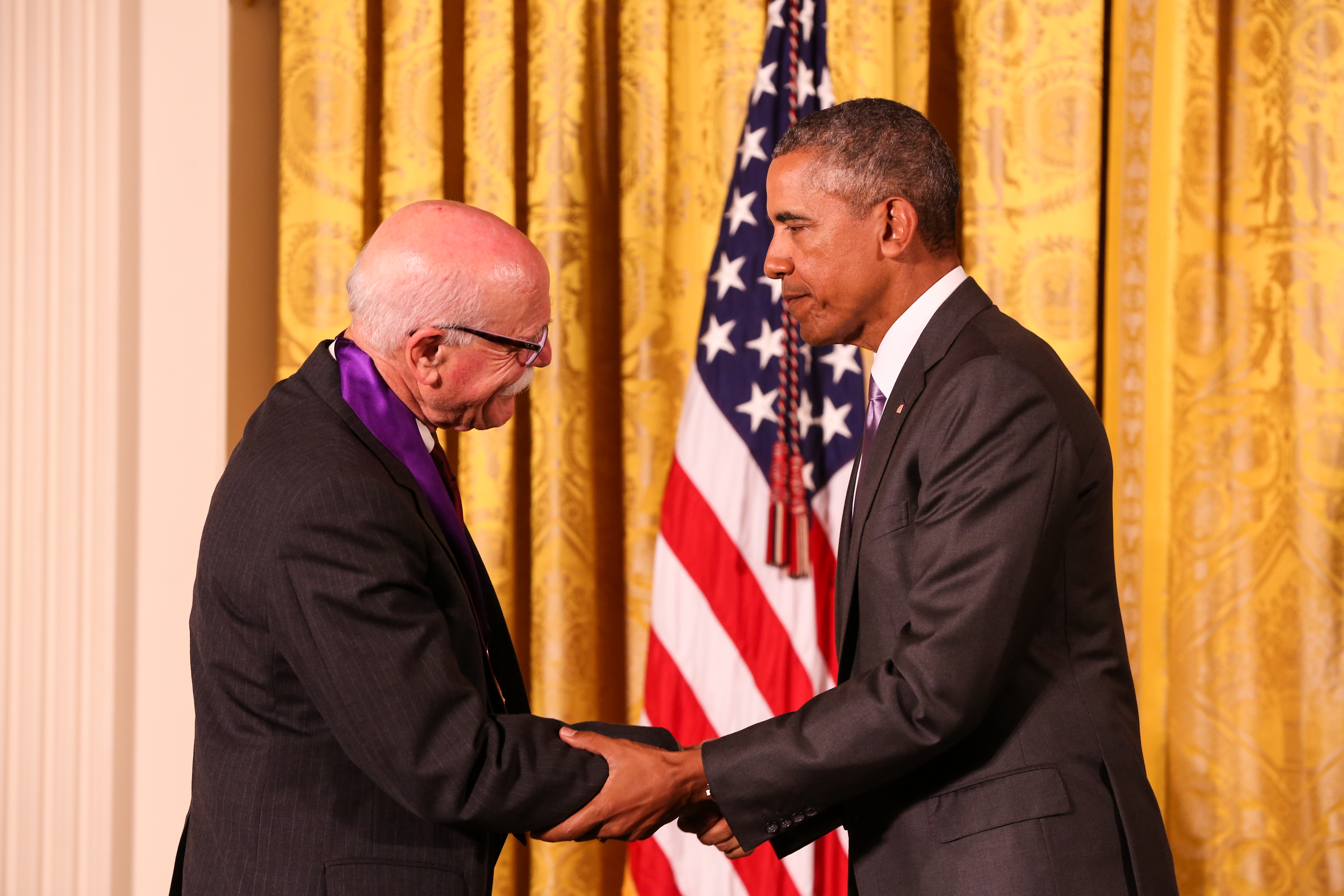 President Obama awards the 2014 National Medal of Arts to author Tobias Wolff.
