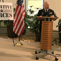A man at a podium.