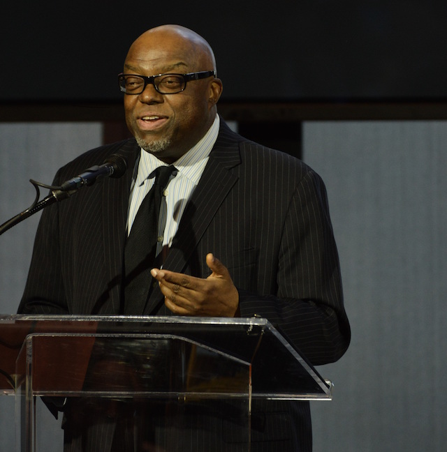 Stanley Crouch at a podium