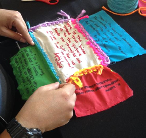 Four patches being woven together. Each patch contains a haiku