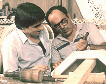 Pilarinos working with an apprentice
