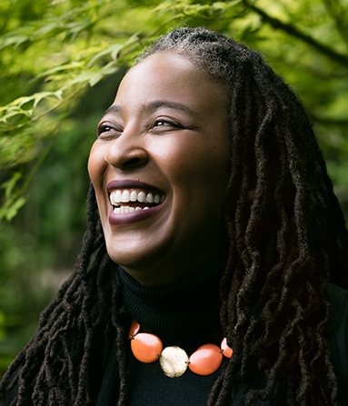 Headshot of a woman smiling.