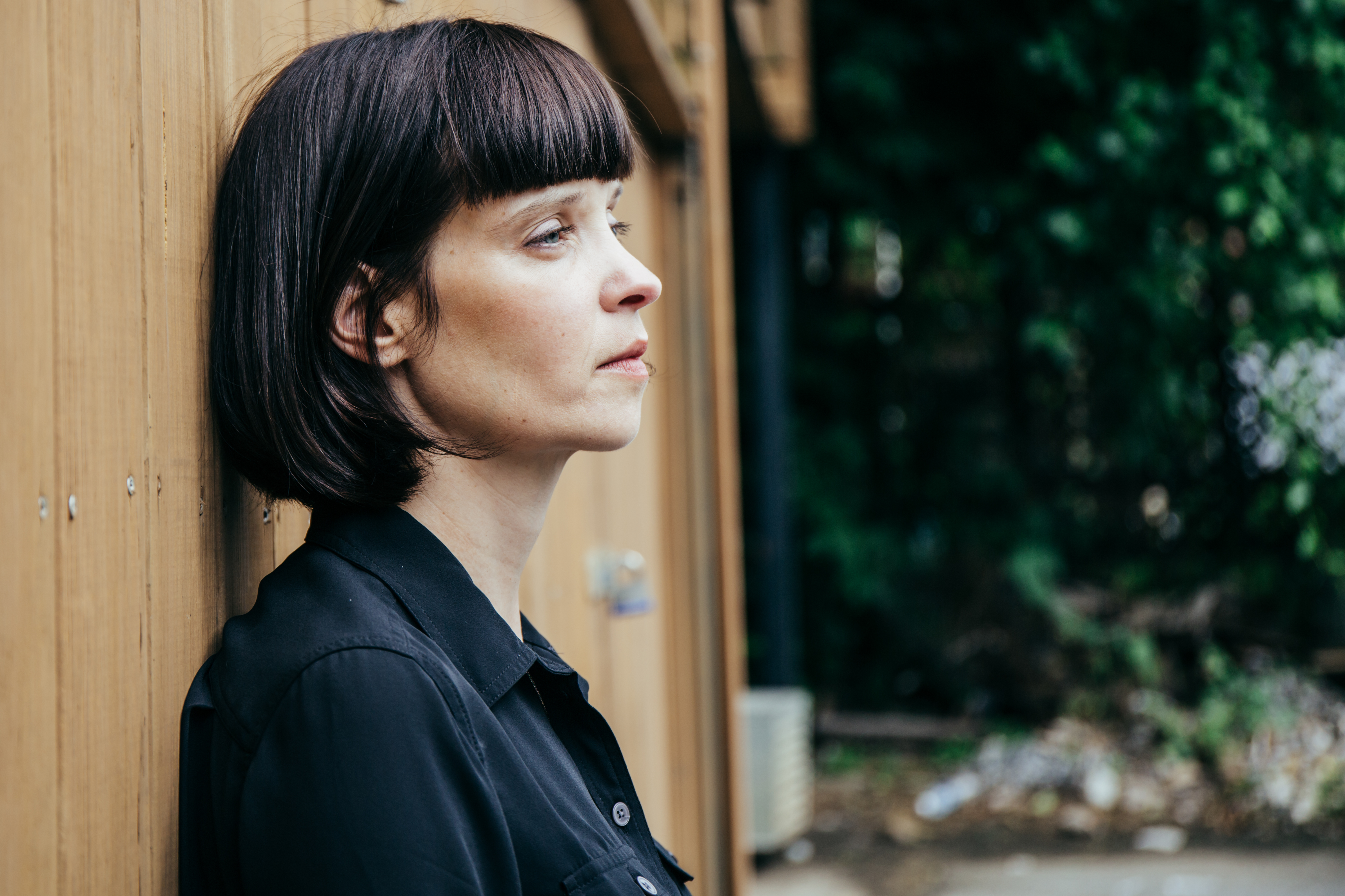 Profile shot of woman with short brown bob haircut