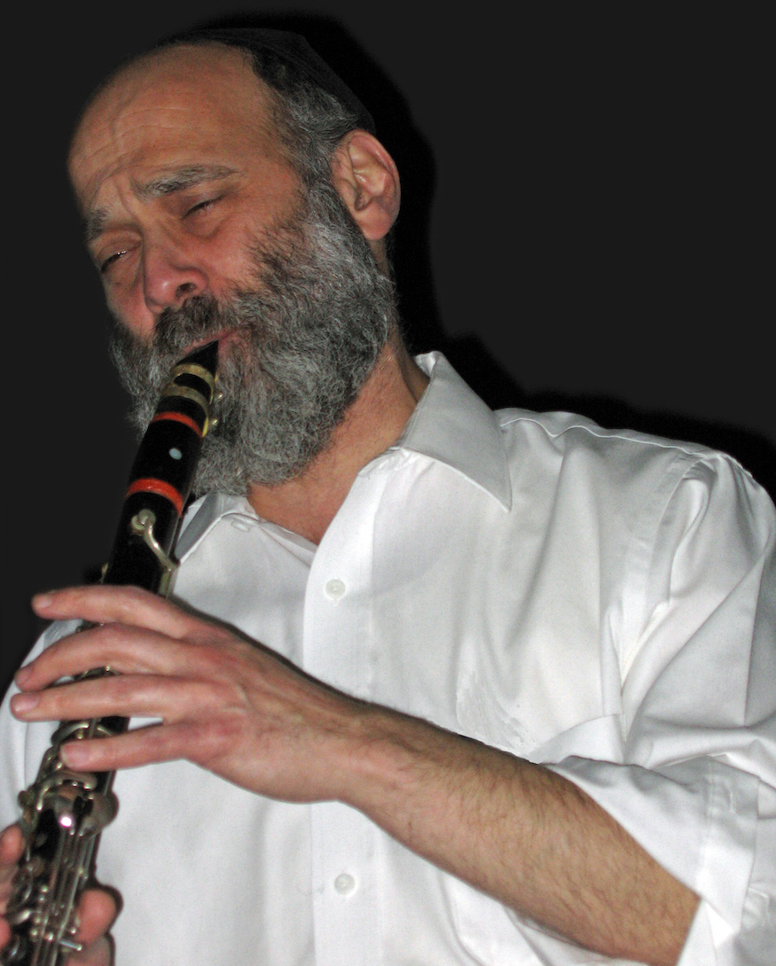 Man playing a clarinete.