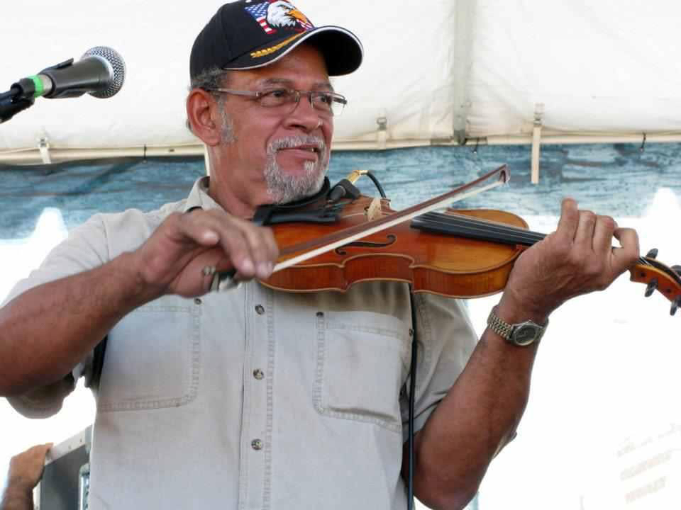 Edward Poullard  playing the fiddle