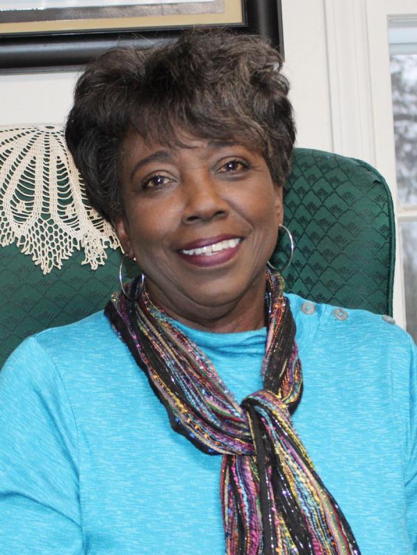 Headshot of a woman.