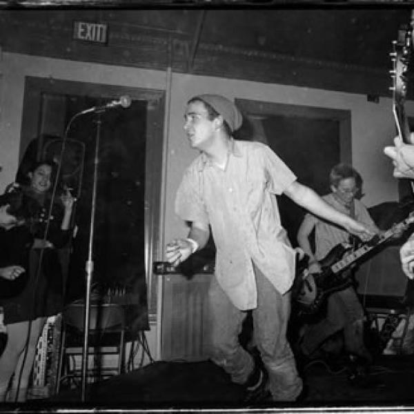 Minor Threat (with Ian MacKaye in middle in hat) performing at the former Washington, DC club dc space. Photo by Susie J. Horgan