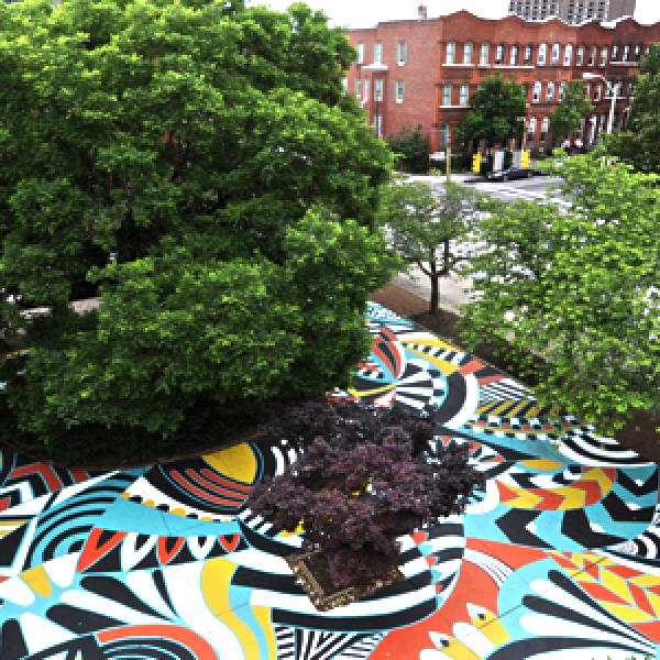 Aerial view of a multicoled plaza in an urban setting