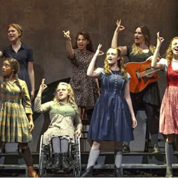 seven women signing a scene in the play Spring Awakening