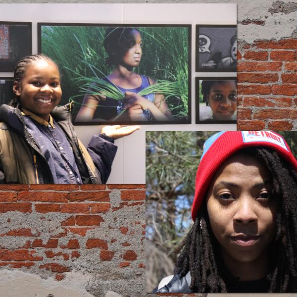 Young African-American youth standing next to his artwork; young African-American girl in red hat.
