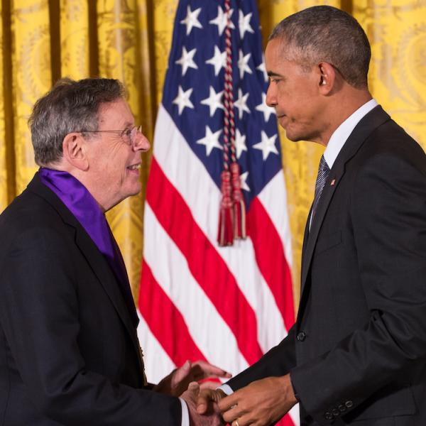 Two men shaking hands.