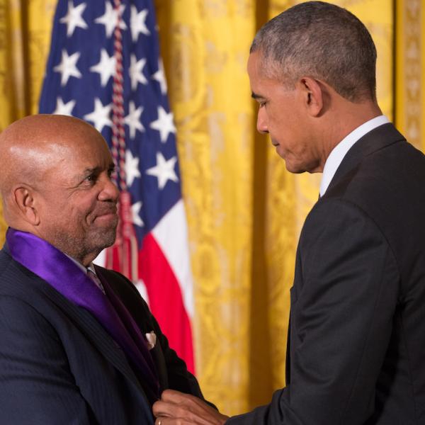 Two men shaking hands.