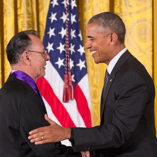 Two men shaking hands.