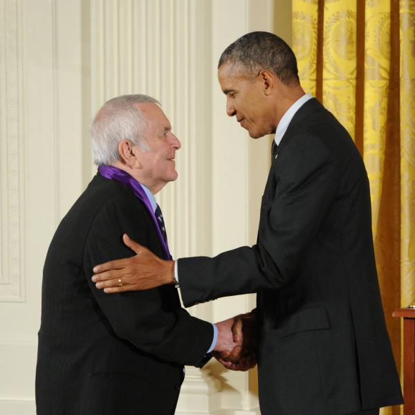 John Kander receiving an award from Barack Obama