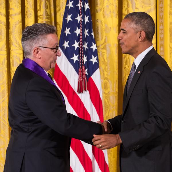 Two men shaking hands.