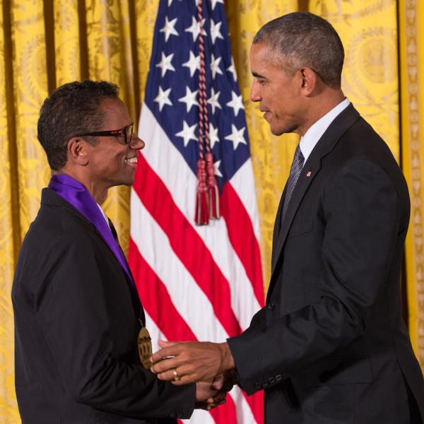 Two men shaking hands.