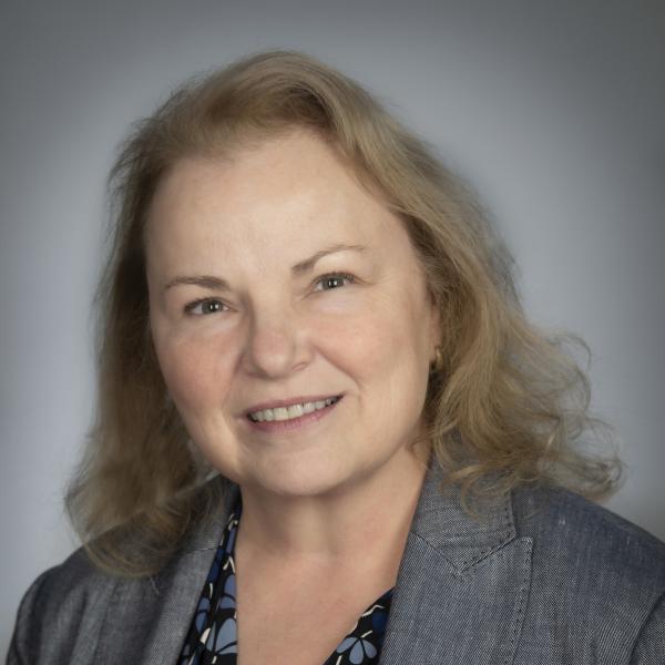 Headshot of a blonde, middle aged woman