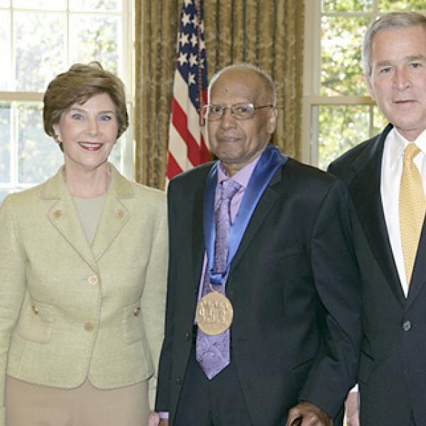 The President and First Lady with Roy R. DeCarava in the Oval Office