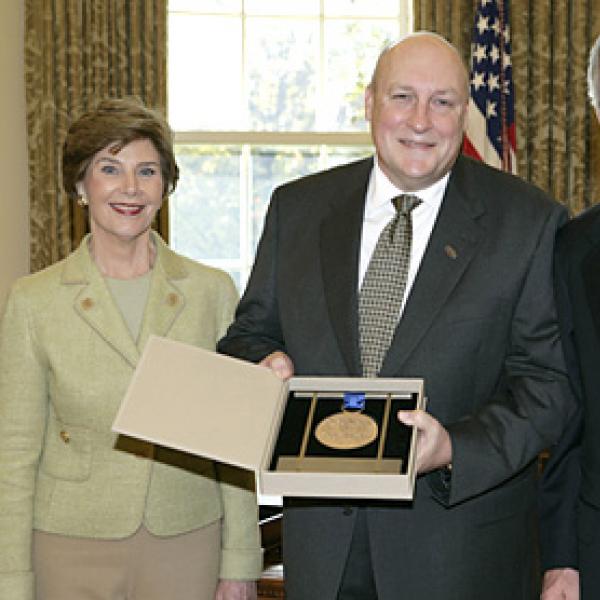 The President and First Lady with Jeffrey Kimpton in the Oval Office