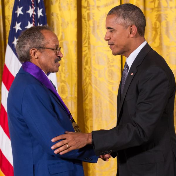Two men shaking hands.
