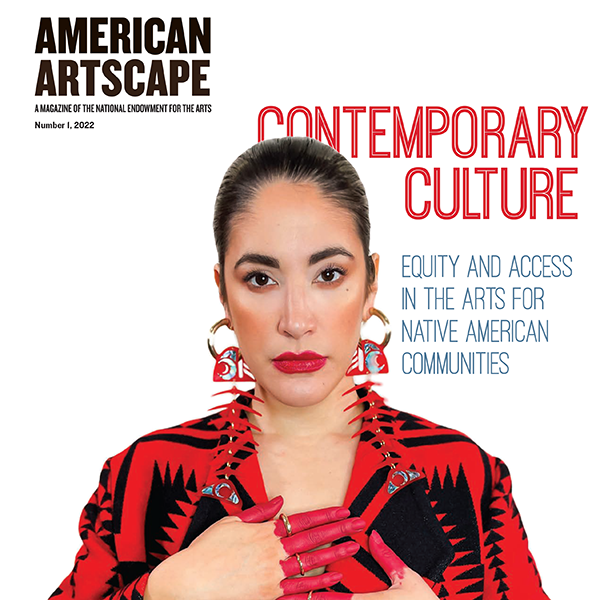 Cover of American Artscape magazine with a photo of a Native American woman in a red and black outfit and her hands painted red. 